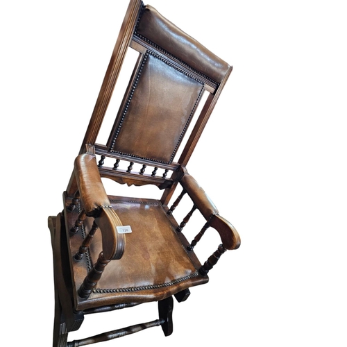 726 - Stunning American rocking chair with leather seat and back and beautiful spindle work