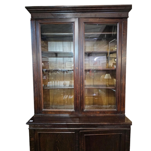 727 - Very large  mahogany two door book case 245cm x 138cm