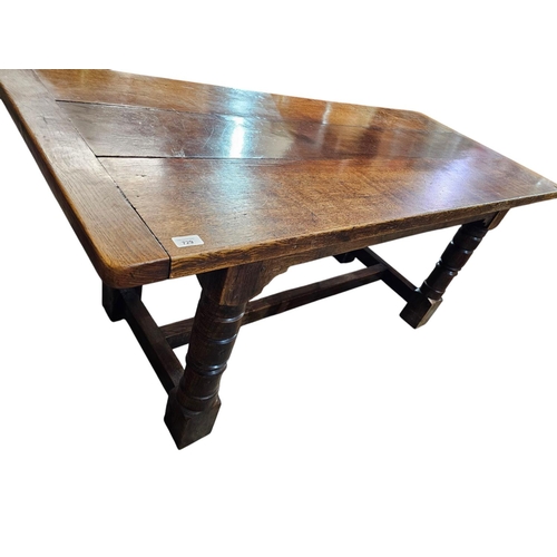 729 - A 17th century style oak refectory type table rectangular top with drawer leaves  and it's raised on... 