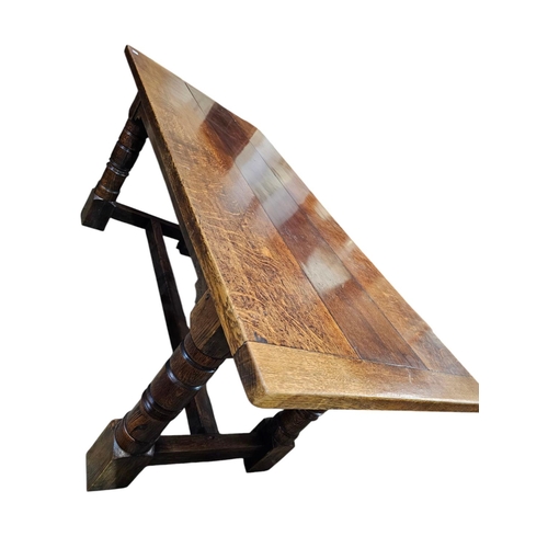 729 - A 17th century style oak refectory type table rectangular top with drawer leaves  and it's raised on... 