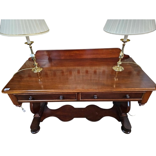 732 - A Victorian mahogany side table with 2 drawers and carved central stretcher