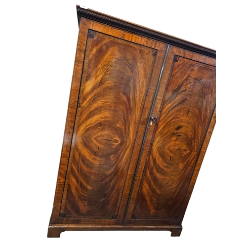 739 - Maple and Co flame mahogany gentleman's small wardrobe with fitted mirror 152cm 113cm