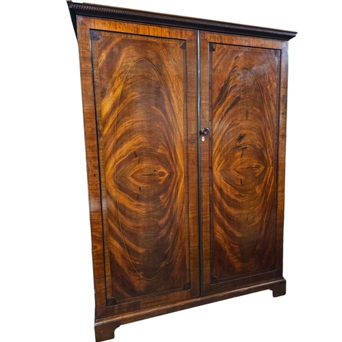 739 - Maple and Co flame mahogany gentleman's small wardrobe with fitted mirror 152cm 113cm