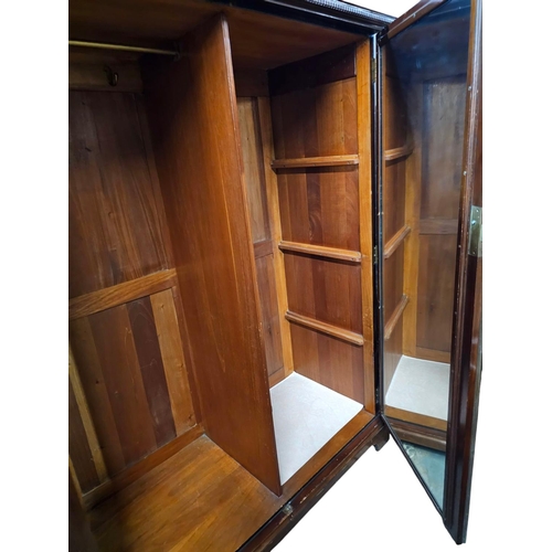 739 - Maple and Co flame mahogany gentleman's small wardrobe with fitted mirror 152cm 113cm