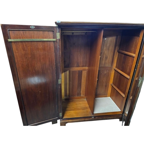 739 - Maple and Co flame mahogany gentleman's small wardrobe with fitted mirror 152cm 113cm