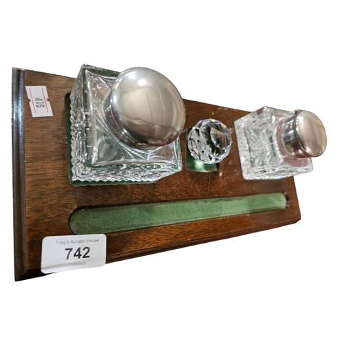 742 - Inkwell set on wooden plinth with 2 glass inkwells with plated tops