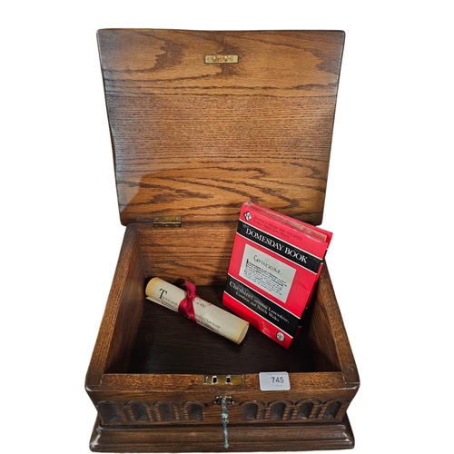 745 - Decorative wooden box to match lot 728 with key including the Doomsday certificate and Doomsday book