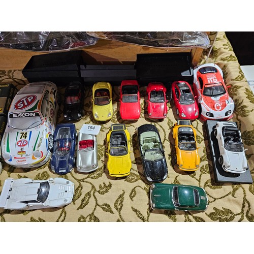 194 - Large collection of model Porsche cars together with a series of Porsche model collection magazines