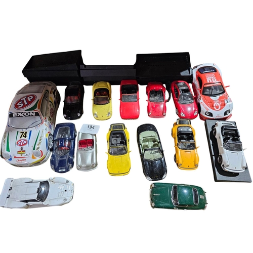 194 - Large collection of model Porsche cars together with a series of Porsche model collection magazines