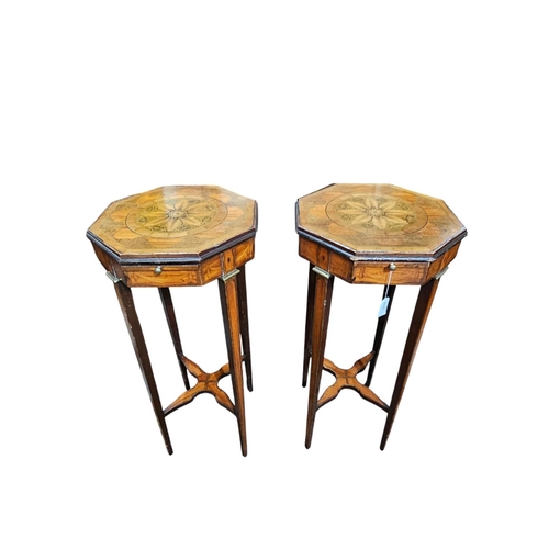 440 - A pair of 19th century kettle stands veneered throughout in mahogany and satinwood. The octagonal to... 