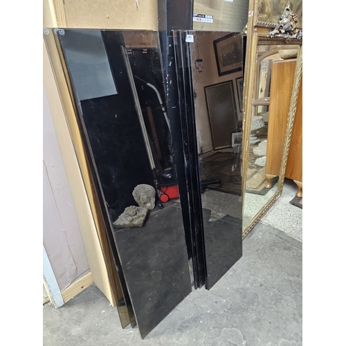 600 - Job lot of multiple black glass panels / shelves  50