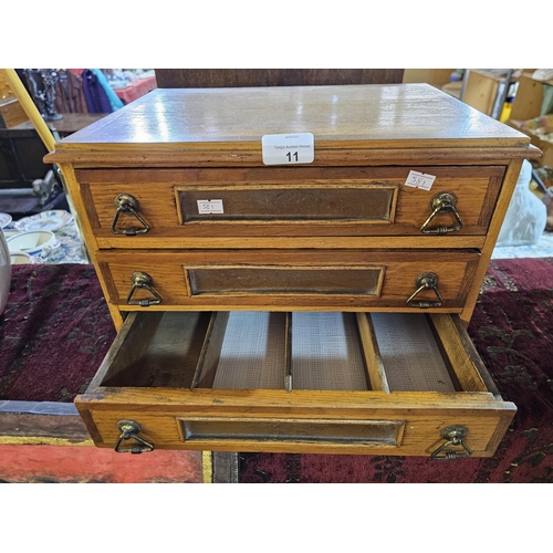 11 - Wooden three drawer jewellery /cutlery chest. 37 w X 27 h cm