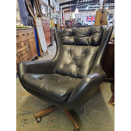 28 - Vintage Black mid century swivel egg chair