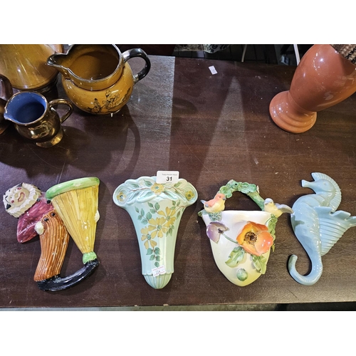 31 - Collection of four vintage wall pocket vases various makers Carlton, Barbola etc