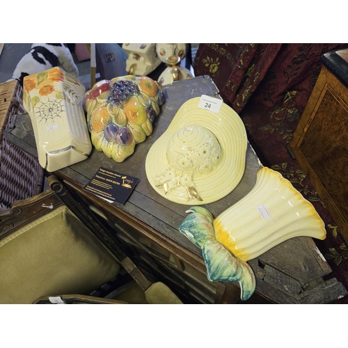 24 - Four vintage Art Deco ceramic wall vases by Arthur Wood and Sylvac