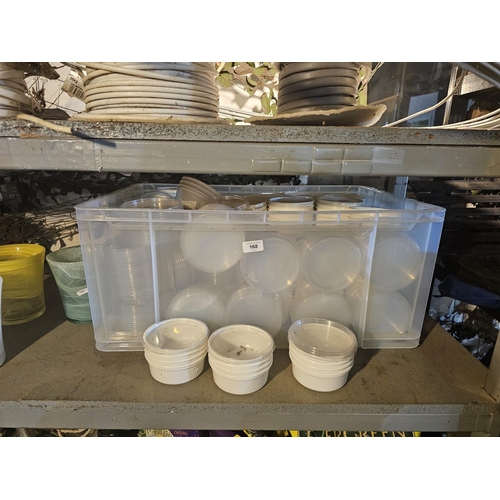 large box of small round containers