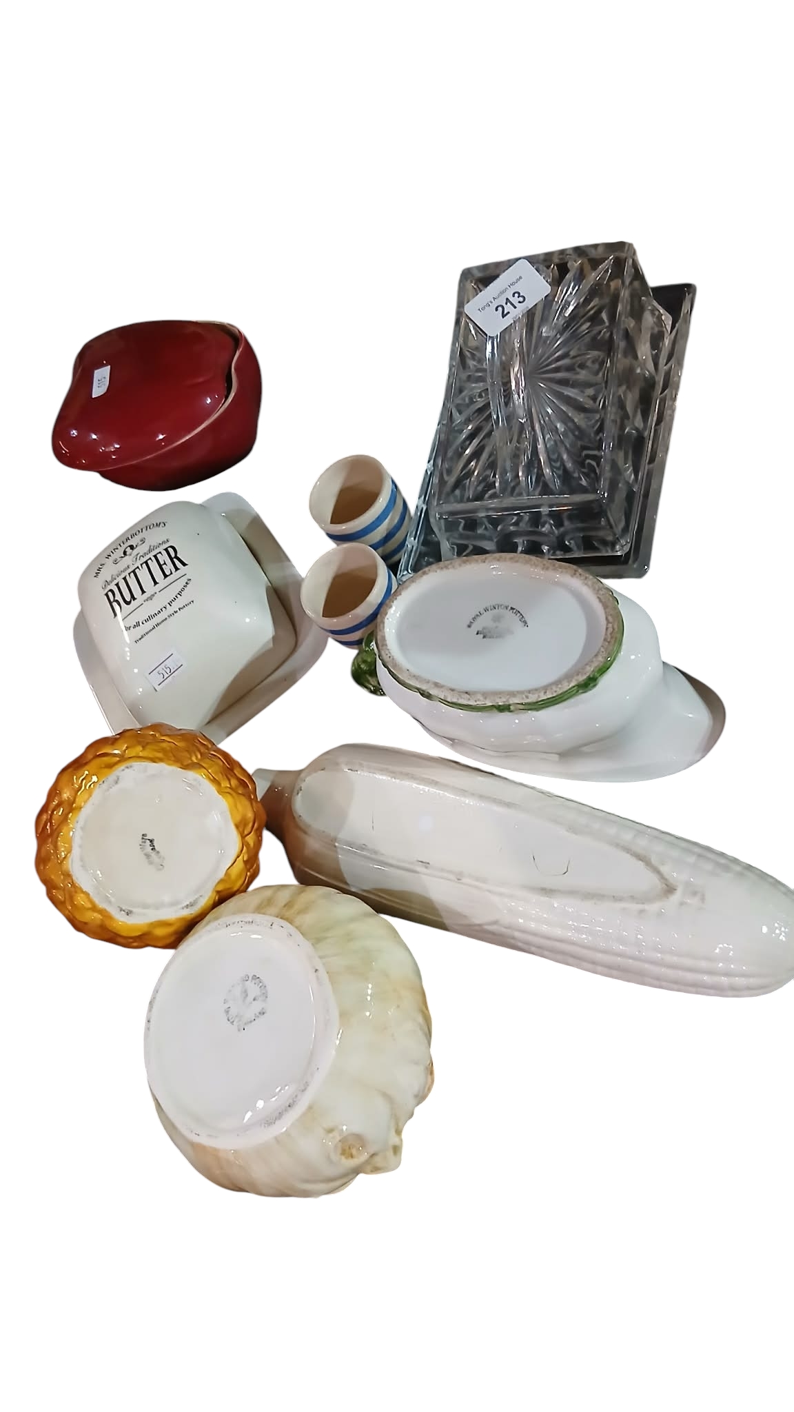 collection of various vintage and antique butter dishes and related items.