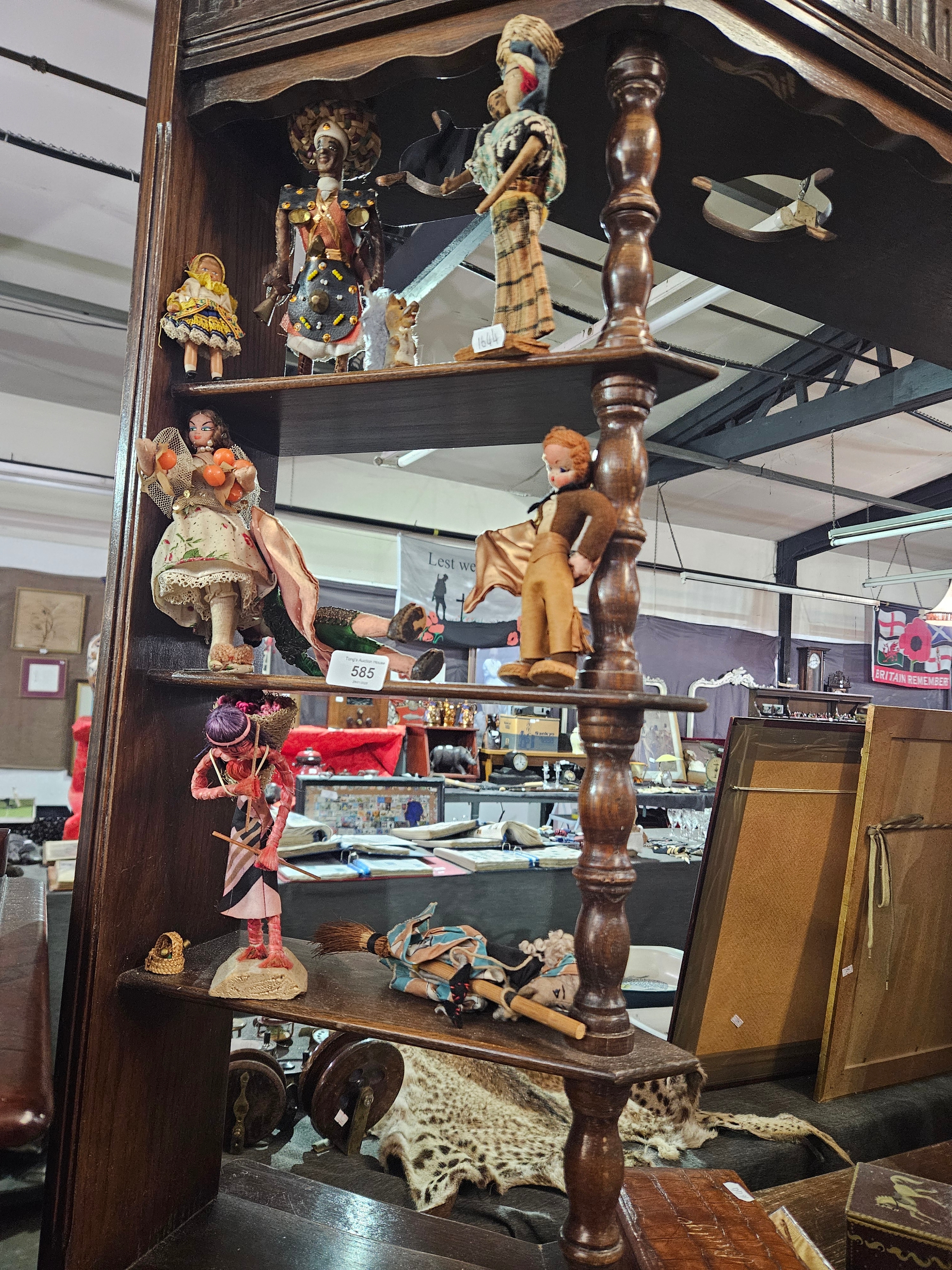 A collection of vintage and antique figures in traditional dress