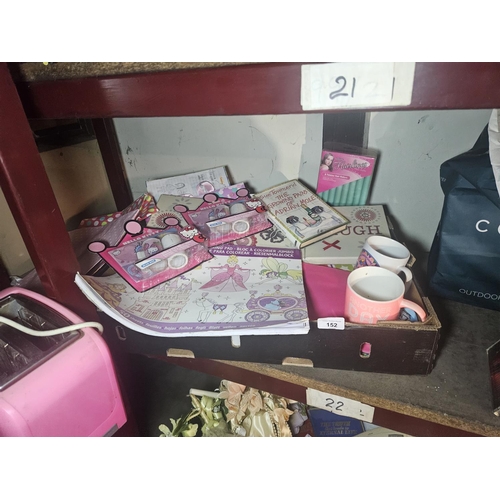 Collection of crafting items, colouring in books and mugs