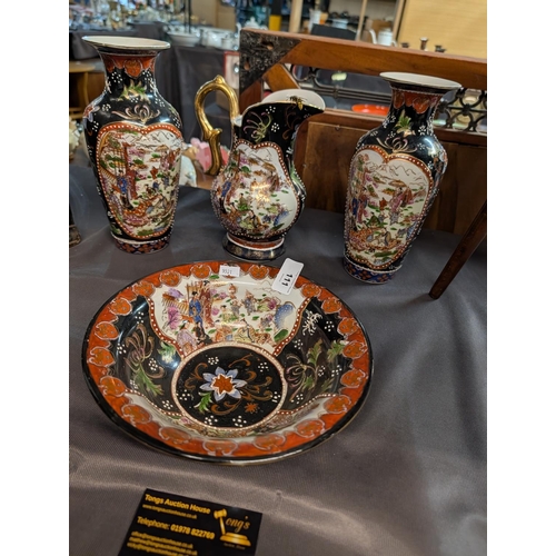 111 - Vintage Oriental Imari matching set consisting of two vases, jug and bowl (wasp extra)