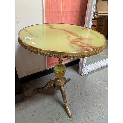 30 - Vintage circular side table with green onyx-effect top surrounded with a filigree patterned brass ri... 