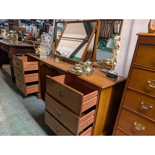 38 - Quality Stag Furniture Teak Dressing Table featuring six drawers and Mirror original brass handles