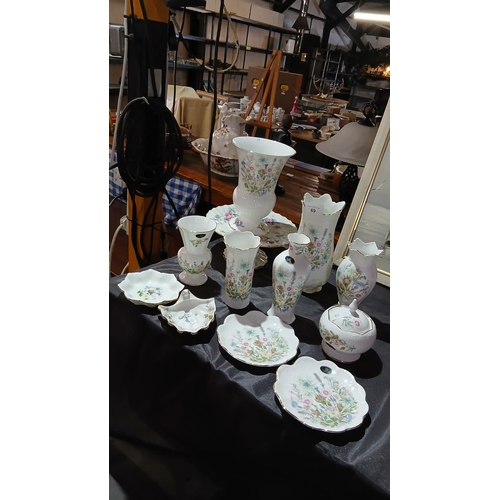 69 - decorative bone china vases, dishes, and a lidded container in the Aynsley 
