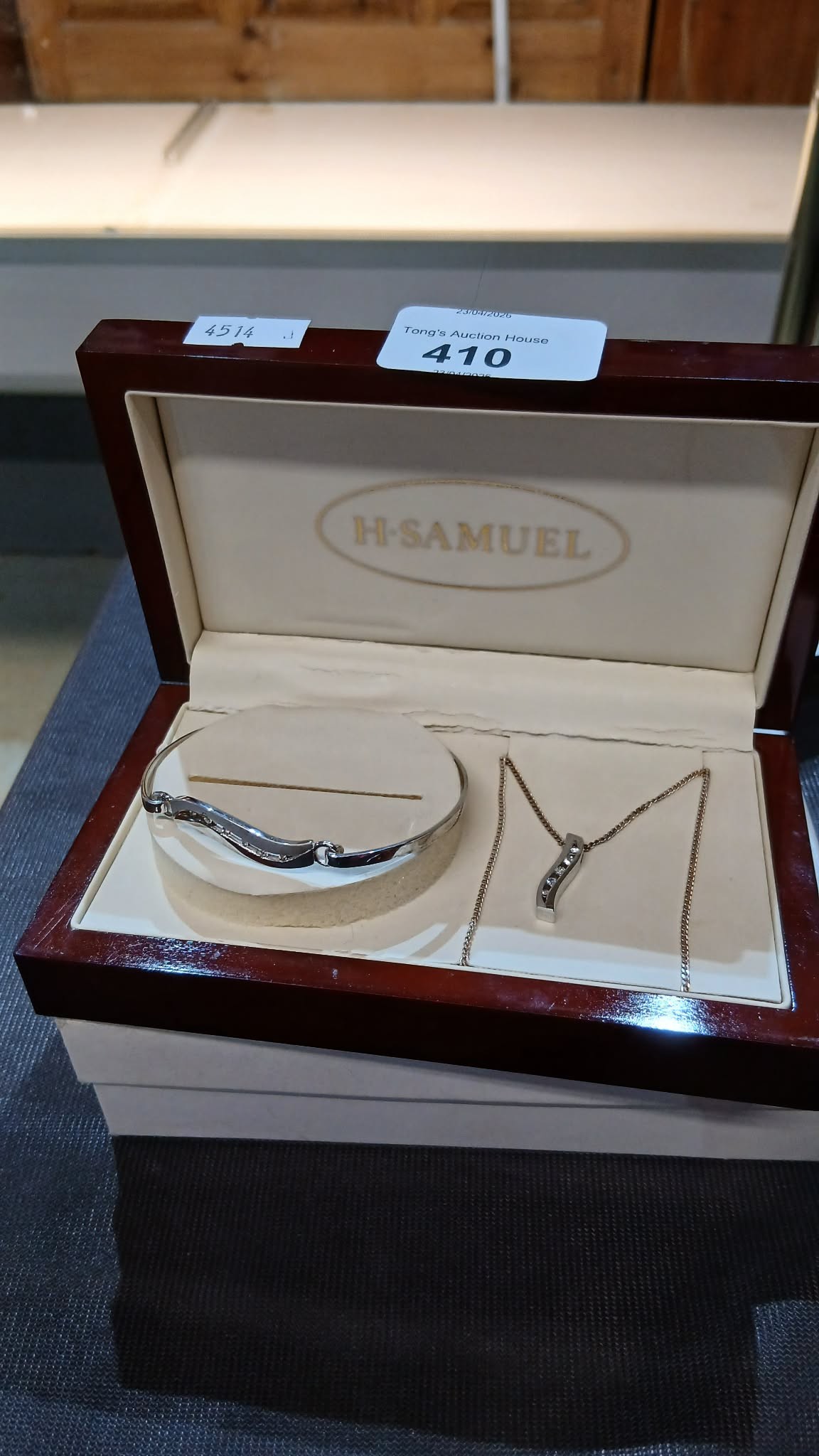 H. Samuel jewelry set includes a matching bracelet and pendant necklace