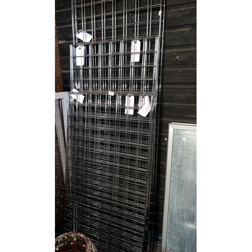 49 - Selection of chrome metal gridwall panels