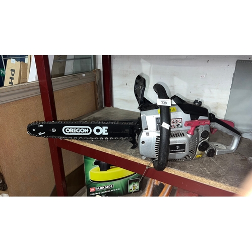 228 - petrol-powered chainsaw from the brand Spear & Jackson.
