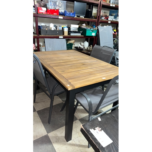 245 - New, outdoor dining set featuring a wooden slatted table 140 x 90 cm