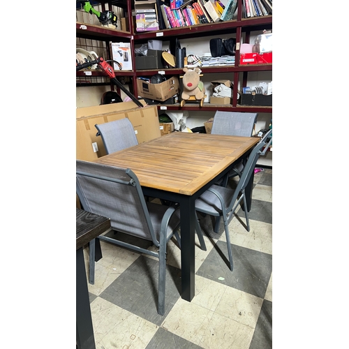 247 - New, outdoor dining set featuring a wooden slatted table 140 x 90 cm