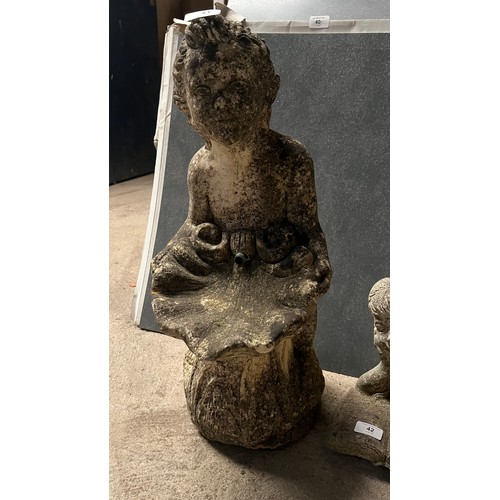 41 - vintage cast stone fountain depicting a young boy or cherub seated on a rock