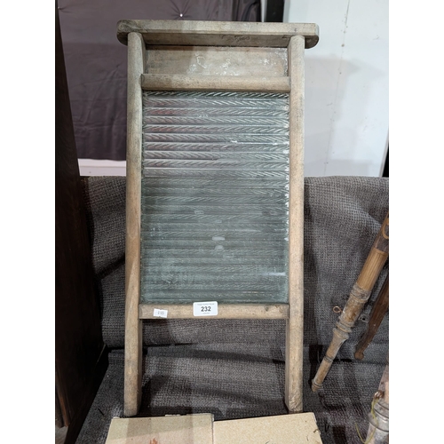 232L - vintage or antique glass washboard featuring a ridged glass scrubbing panel set within a wooden fram... 