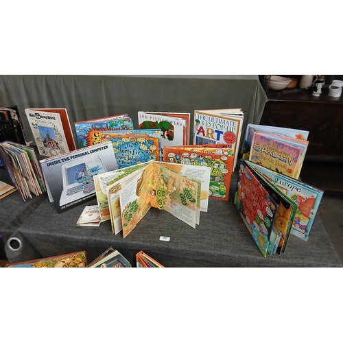 447 - features a collection of vintage pop-up and children's books, with the central item being The Origin... 