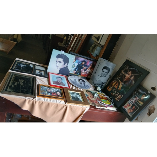 519 - collection of memorabilia features various items dedicated to Elvis Presley, including framed photog... 