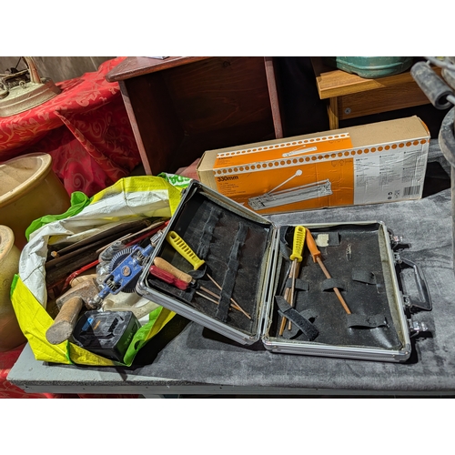 61H - manual tile cutter in its original packaging. And job lot of tools and case