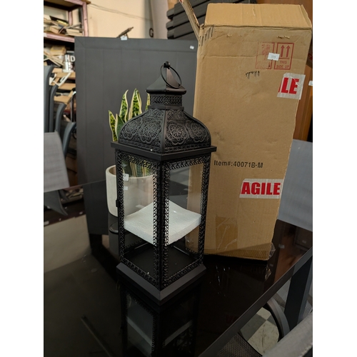 60I - black metal and glass candle lantern