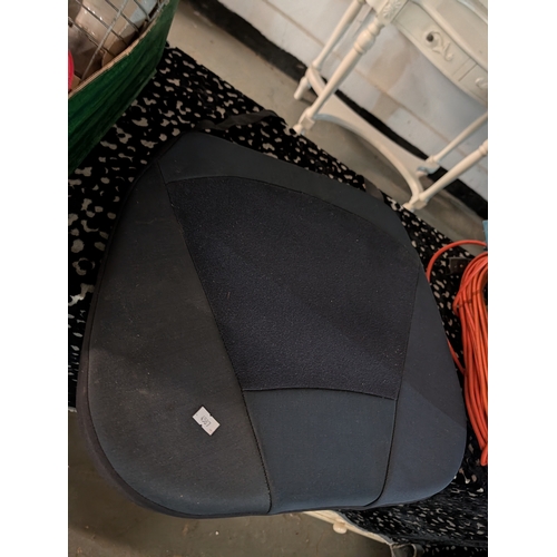 60V - black ergonomic car seat cushion designed for comfort and back pain relief.
