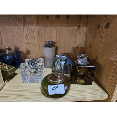 255 - Collection of vintage lighters to include retro Space Age lighters and onyx