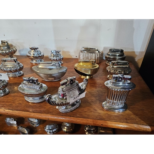 320 - Collection of decorative metal vintage lighters