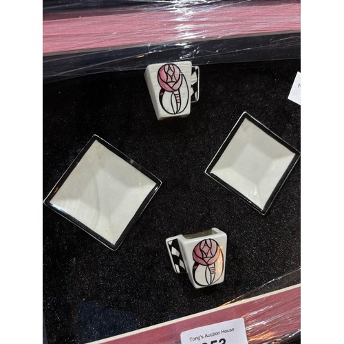 353 - An unusual Lorna Bailey Artware boxed and framed display featuring two miniature cups and two saucer... 