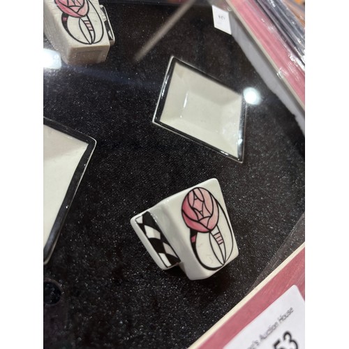 353 - An unusual Lorna Bailey Artware boxed and framed display featuring two miniature cups and two saucer... 