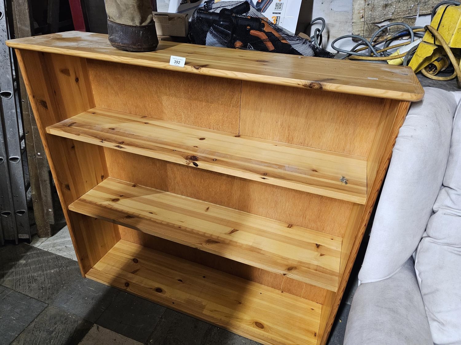 wooden pine bookcase with three shelves and a warm natural finish ...