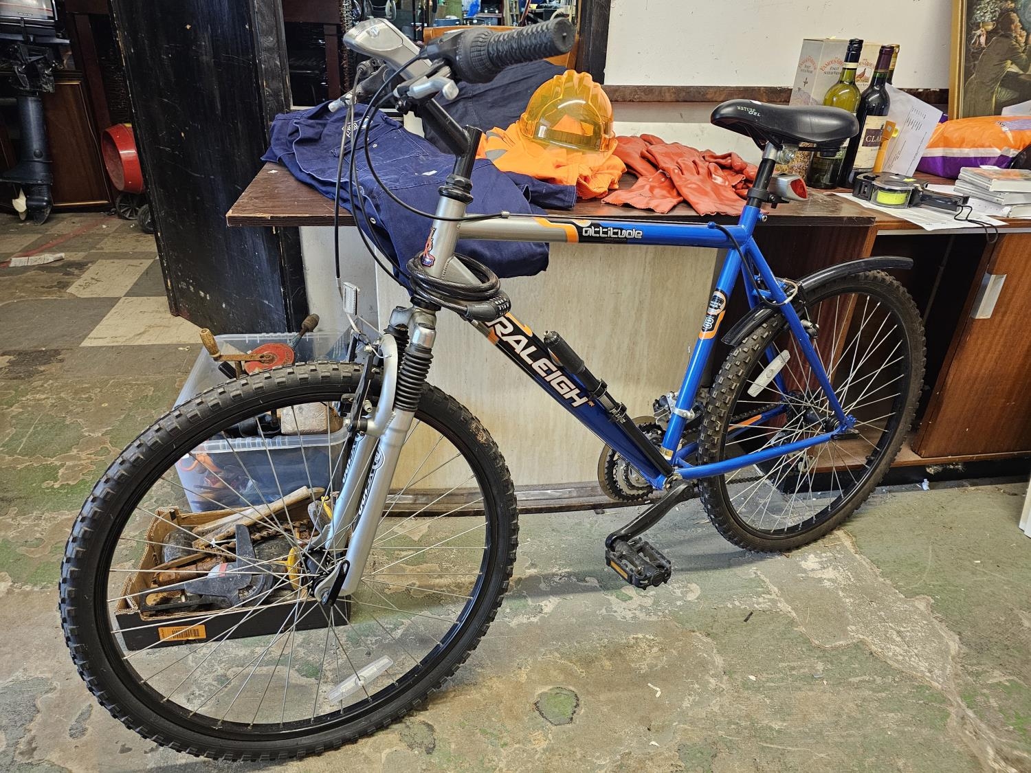 blue and silver Raleigh Attitude 26-inch hardtail mountain bike with ...