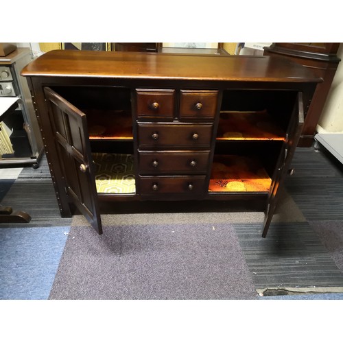 713 - Sideboard measuring 148 cms wide, height 80 cms and 50 cms deep.  Two over Three drawers to centre a... 