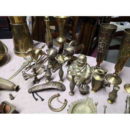 723 - Selection of brassware including vases and figures and horse brasses.