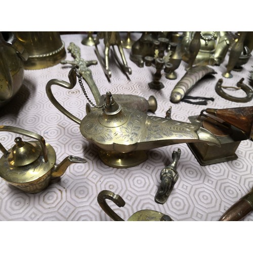 723 - Selection of brassware including vases and figures and horse brasses.