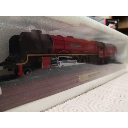 726 - 3 boxed models, a LNER Flying Scotsman train, a Duchess LMS train and an autoshop 69 SS 396 Camaro