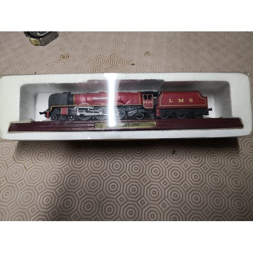 726 - 3 boxed models, a LNER Flying Scotsman train, a Duchess LMS train and an autoshop 69 SS 396 Camaro